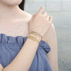 Pulsera Elegante 03.351.0037.08 Oro Laminado, Diseño de Guadalupe y Flor, Pulido, Tono Dorado (05 MM Thickness, 8 Inches Length)