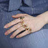 Anillo Multi Piedra 01.283.0010.07 Oro Laminado, Diseño de Flor, con Negro and Blanca Zirconia Cubica, Pulido, Tono Dorado (Size 7)