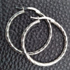 Argolla Pequeña 02.389.0127.25 Plata Rodinada, Diseño de Torcido, Diamantado, Tono Plateado
