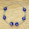 Pulsera Bolo Ajustable 03.402.0021.07 Plata Rodinada, Diseño de Bola y Ojo Griego, con Cristal Turquoise y Topacio Azul, Pulido, Tono Plateado (Grosor 02 MM, 7 Pulgadas de Largo)