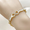 Pulsera Elegante 03.266.0078.08 Oro Laminado, Diseño de Infinito y Baguette, con Zirconia Cubica Blanca, Pulido, Tono Dorado (Grosor 07 MM, 8 Pulgadas de Largo)