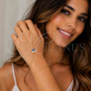 Pulsera Elegante 03.60.0164.13 Oro Laminado, Diseño de Ojo Griego y Baguette, con Zirconia Cubica Blanca, Esmaltado Azul, Tono Dorado (Grosor 01 MM, 13 Pulgadas de Largo)