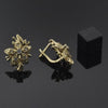Arete Gancho Frances 02.21.0247 Oro Laminado, Diseño de Flor, con Zirconia Cubica Chanpan Oscuro, Pulido, Dorado