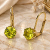 Arete Gancho Frances 5.128.076 Oro Laminado, con Zirconia Cubica Peridoto Oscuro, Pulido, Tono Dorado