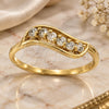 Anillo Multi Piedra 5.167.021.07 Oro Laminado, Diseño de Oja, con Zirconia Cubica Blanca, Pulido, Tono Dorado (Tamaño 7)