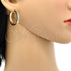 Argolla Huggie 02.167.0002.30 Oro Laminado, con Blanca Micro Pave, Pulido, Tono Dorado