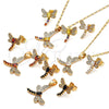 Juego de Arete y Dije de Adulto 10.316.0034 Oro Laminado, Diseño de Libélula, con Blanca Zirconia Cubica, Pulido, Tono Dorado