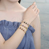 Pulsera Elegante 03.210.0115.07 Oro Laminado, Diseño de Oja, con Negro and Blanca Zirconia Cubica, Pulido, Tono Dorado (07 MM Thickness, 7 Inches Length)
