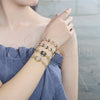Pulsera Elegante 03.316.0076.07 Oro Laminado, Diseño de Flor, con Negro and Blanca Zirconia Cubica, Pulido, Tono Dorado (04 MM Thickness, 7 Inches Length)