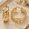 Argolla Mediana 02.160.0016.30 Oro Laminado, Diseño de Besos y Abrazos, Pulido, Tono Dorado