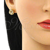 Arete Dormilona 02.342.0123 Oro Laminado, Diseño de Nudo, con Blanca Micro Pave, Pulido, Tono Dorado