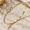 Aro Individual 07.193.0039.04 Oro Laminado, Diseño de Delfín, con Zirconia Cubica Blanca y Micro Pave Negro, Pulido, Tono Dorado (Grosor 02 MM, Talla 4 (2,25 de Diámetro))