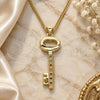 Collares con Dije 04.156.0429.1.20 Oro Laminado, Diseño de Llave, con Micro Pave Granate y Blanca, Pulido, Tono Dorado (Grosor 02 MM, 20 Pulgadas de Largo)