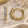 Argolla Huggie 02.210.0643.3.12 Oro Laminado, con Zirconia Cubica Amatista, Pulido, Tono Dorado