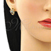 Argolla Huggie 02.210.0653.1.15 Oro Laminado, Diseño de Flor y Corazón, con Aqua Azul Zirconia Cubica, Pulido, Tono Dorado