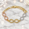Pulsera Elegante 03.380.0131.07 Oro Laminado, Diseño de Infinito, con Cristal Blanca, Pulido, Tres Tonos (Grosor 05 MM, 7 Pulgadas de Largo)