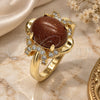 Anillo Multi Piedra 01.284.0064.09 Oro Laminado, con Goldstone Venturina Onix Negro y Micro Pave Blanca, Pulido, Tono Dorado (Tamaño 9)