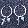 Argolla Pequeña 02.401.0034.15 Plata Rodinada, Diseño de Ojo Griego y Cruz, con Zirconia Cubica Aqua Azul, Pulido, Tono Plateado