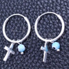 Argolla Pequeña 02.401.0034.15 Plata Rodinada, Diseño de Ojo Griego y Cruz, con Zirconia Cubica Aqua Azul, Pulido, Tono Plateado