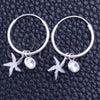 Argolla Pequeña 02.401.0042.15 Plata Rodinada, Diseño de Flor, con Zirconia Cubica Blanca, Pulido, Tono Plateado