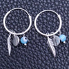 Argolla Pequeña 02.402.0001.15 Plata Rodinada, Diseño de Ojo Griego y Bola, con Cristal Aqua Azul, Pulido, Tono Plateado