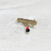 Broche Básico 13.185.0001 Oro Laminado, Diseño de Con Nombre, con Cristal Negro y Rojo Naranja, Pulido, Tono Dorado