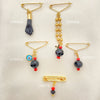 Kit Surtido de 35 Broches con Dije de Azabache de Oro Laminado al por mayor — SKU 152439