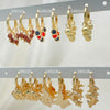Kit Surtido de 30 Argollas Huggies con Dijes de Oro Laminado al por mayor — SKU 152731