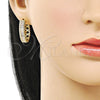 Argolla Huggie 02.283.0273.25 Oro Laminado, Diseño de Baguette y Cluster, con Blanca Zirconia Cubica and Blanca Micro Pave, Pulido, Tono Dorado