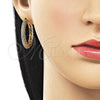Argolla Huggie 02.283.0341.30 Oro Laminado, con Blanca Micro Pave, Pulido, Tono Dorado