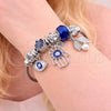 Aro Individual 07.463.0018 Acero Inoxidable, Diseño de Mano de Dios y Ojo Griego, con Cristal Tanzanite y Crystal, Esmaltado Azul, Tono Plateado (Grosor 03 MM, Talla Unica)