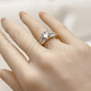 Anillo Multi Piedra 01.424.0016 Oro Laminado, Diseño de Baguette y Cluster, con Zirconia Cubica Blanca y Micro Pave Blanca, Pulido, Tono Dorado (Talla Unica)
