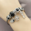 Aro Individual 07.464.0033 Acero Inoxidable, Diseño de Llave y Maleta, con Zirconia Cubica Blanca y Cristal Jet, Esmaltado Negro, Rodinado (Grosor 03 MM, Talla Unica)