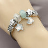 Aro Individual 07.464.0048 Acero Inoxidable, Diseño de Luna y Estrella, con Cristal Crystal y Turquoise, Esmaltado Blanco, Rodinado (Grosor 03 MM, Talla Unica)