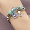 Aro Individual 07.454.0032 Acero Inoxidable, Diseño de Mariposa y Pina, con Cristal Light Turquoise y Turquoise, Pulido, Rodinado (Grosor 03 MM, Talla Unica)