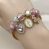 Aro Individual 07.454.0040 Acero Inoxidable, Diseño de Guadalupe y Corazón, con Cristal Light Rose y Crystal, Pulido, Tono Dorado (Grosor 03 MM, Talla Unica)