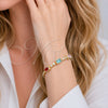 Pulsera Elegante 03.130.0029.07 Oro Laminado, Diseño de Cluster y Baguette, con Zirconia Cubica Multicolor y Blanca, Pulido, Tono Dorado (Grosor 02 MM, 7 Pulgadas de Largo)
