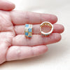 Argolla Huggie 02.267.0073.3.16 Oro Laminado, Diseño de Baguette y Corazón, con Zirconia Cubica Turquoise y Blanca, Pulido, Tono Dorado