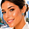 Argolla Huggie 02.210.0861.6.18 Rodio Laminado, Diseño de Flor, con Zirconia Cubica Turquoise y Micro Pave Blanca, Pulido, Rodinado