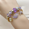 Aro Individual 07.464.0056 Acero Inoxidable, Diseño de Concha y Estrella, con Cristal Crystal y Violet, Pulido, Tono Dorado (Grosor 03 MM, Talla Unica)