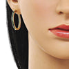 Argolla Huggie 02.195.0297.4.30 Oro Laminado, con Zirconia Cubica Verde, Pulido, Dorado